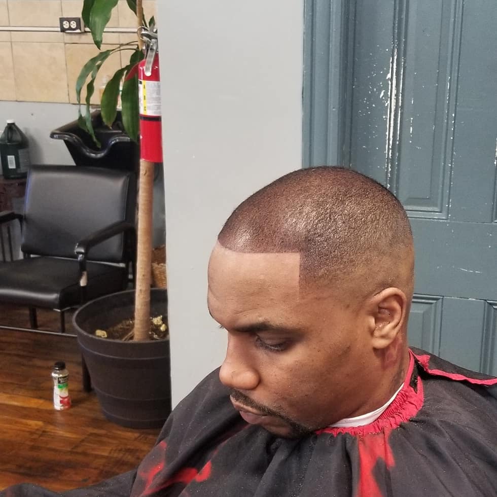 After: close-cropped haircut